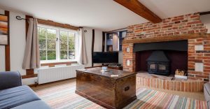 Inglenook style fireplace in home living room